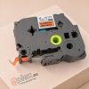 Brother TZE-B31 12m*8mm utángyártott Fluoreszkáló Narancs alapon fekete feliratozószalag kazetta
